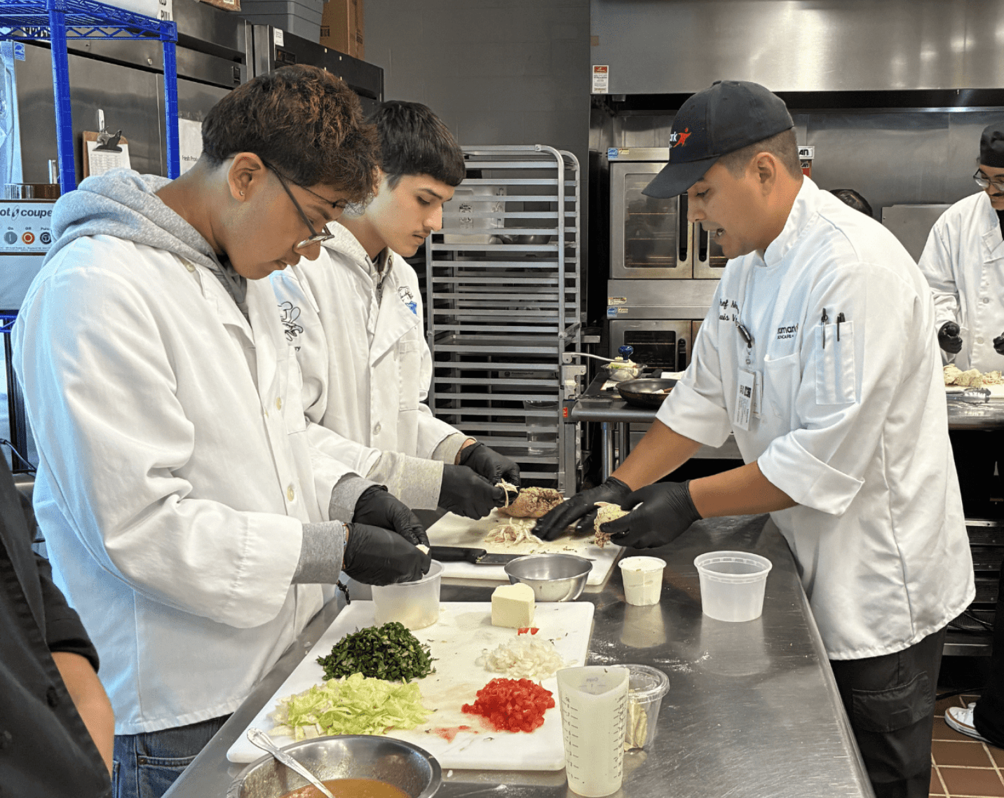 A chef and students. 
